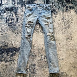 AMIRI SKINNY THRASHER JEANS